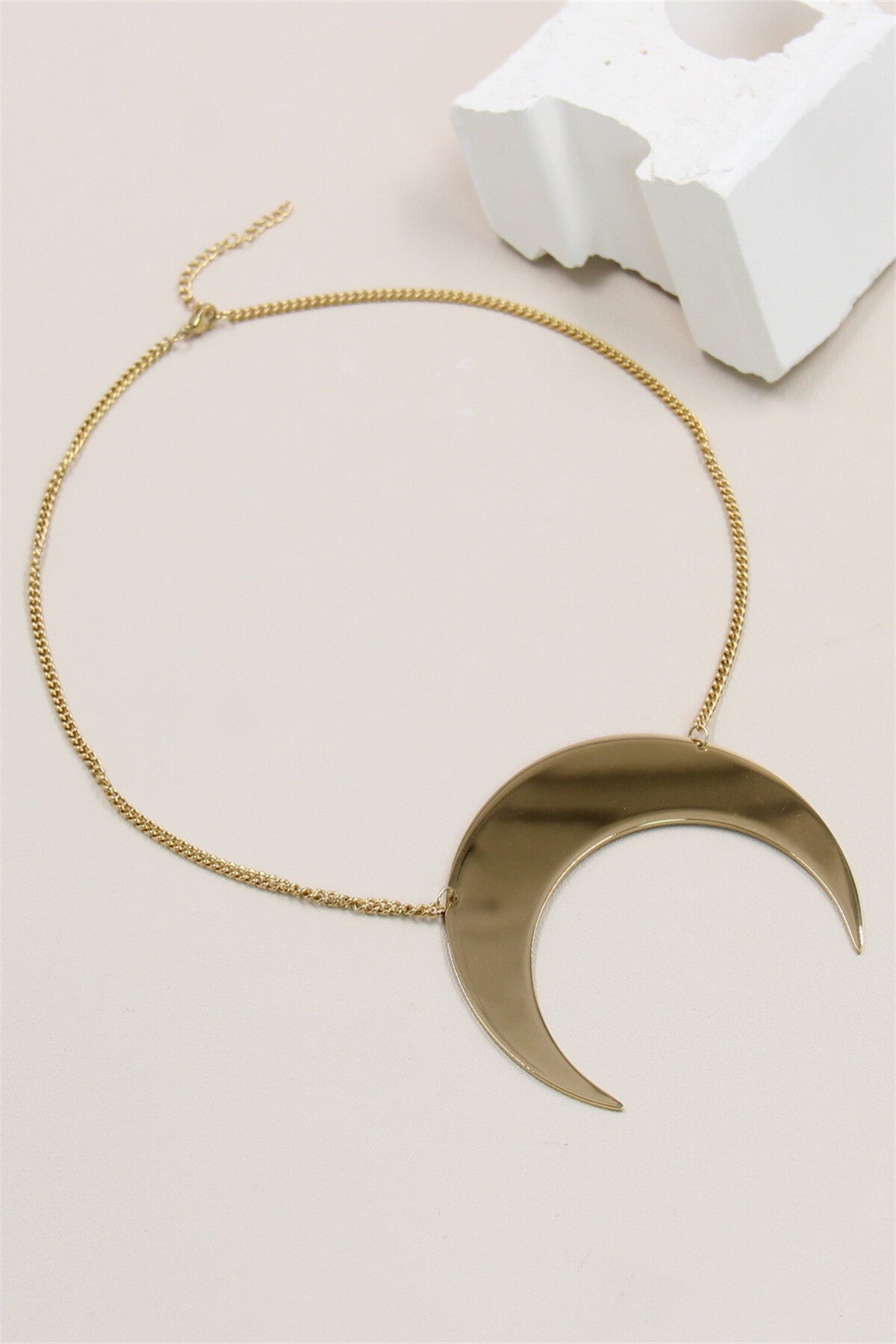 Collier à forme géométrique