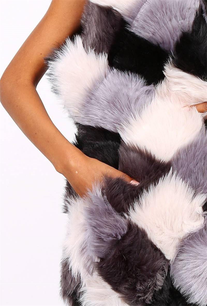 Veste sans manche fausse fourrure
